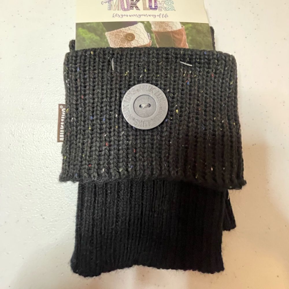 The Original Muk Luks. Black with colored speckles.